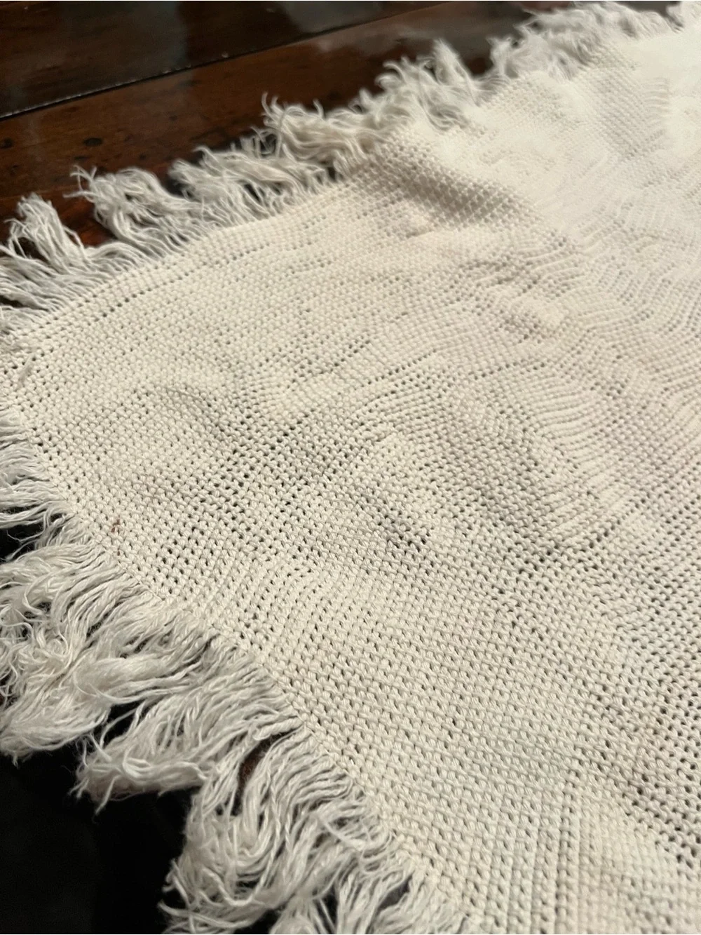 Cream Fringed table scarf or dresser scarf.